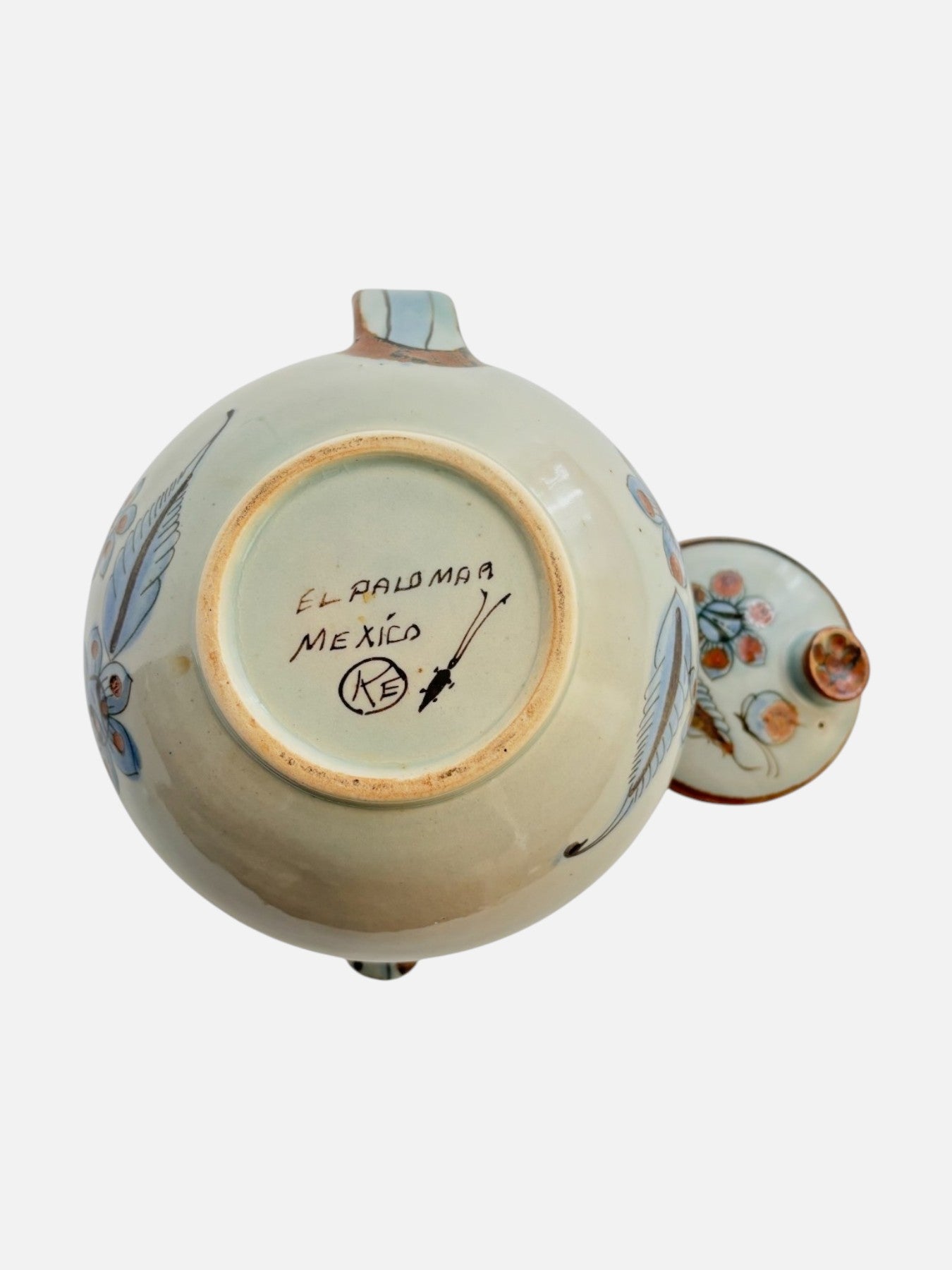 Vintage Ken Edwards Tonala hand-painted and signed round ceramic teapot with lid and handle handmade in Mexico featuring bird and floral design bottom view showing the signed base