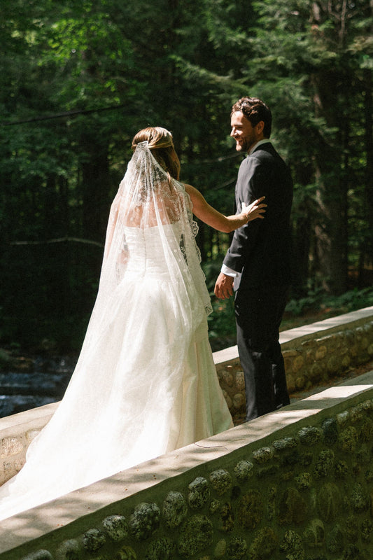 THE BRIDE WORE AN ANTIQUE LACE VEIL