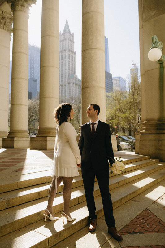 THE BRIDE WORE AN IVORY GROSGRAIN BOW TO CITY HALL