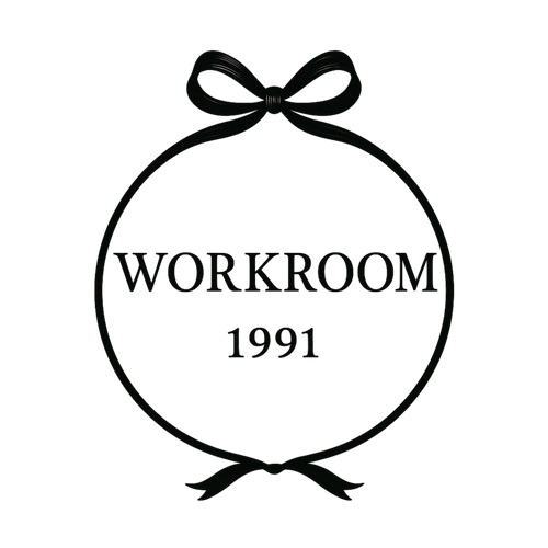 Logo with 'WORKROOM 1991' text and a bow design on a white background