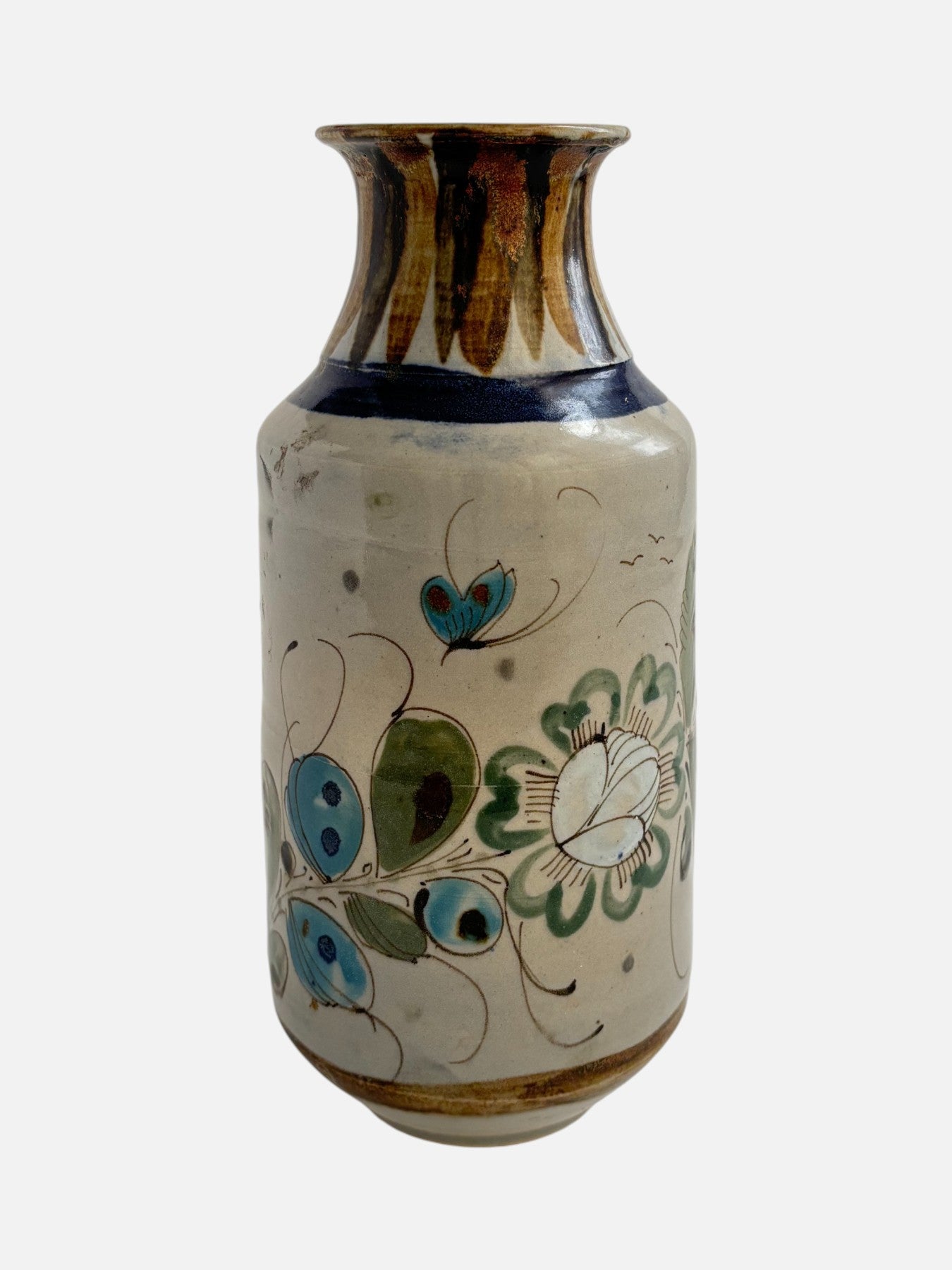 Vintage Ken Edwards Tonala hand-painted and signed tall ceramic vase handmade in Mexico featuring floral design shown from the front view