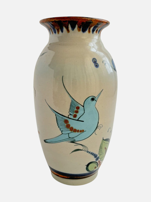 Vintage Ken Edwards Tonala hand-painted and signed tall ceramic vase handmade in Mexico featuring bird and floral design shown from the front view