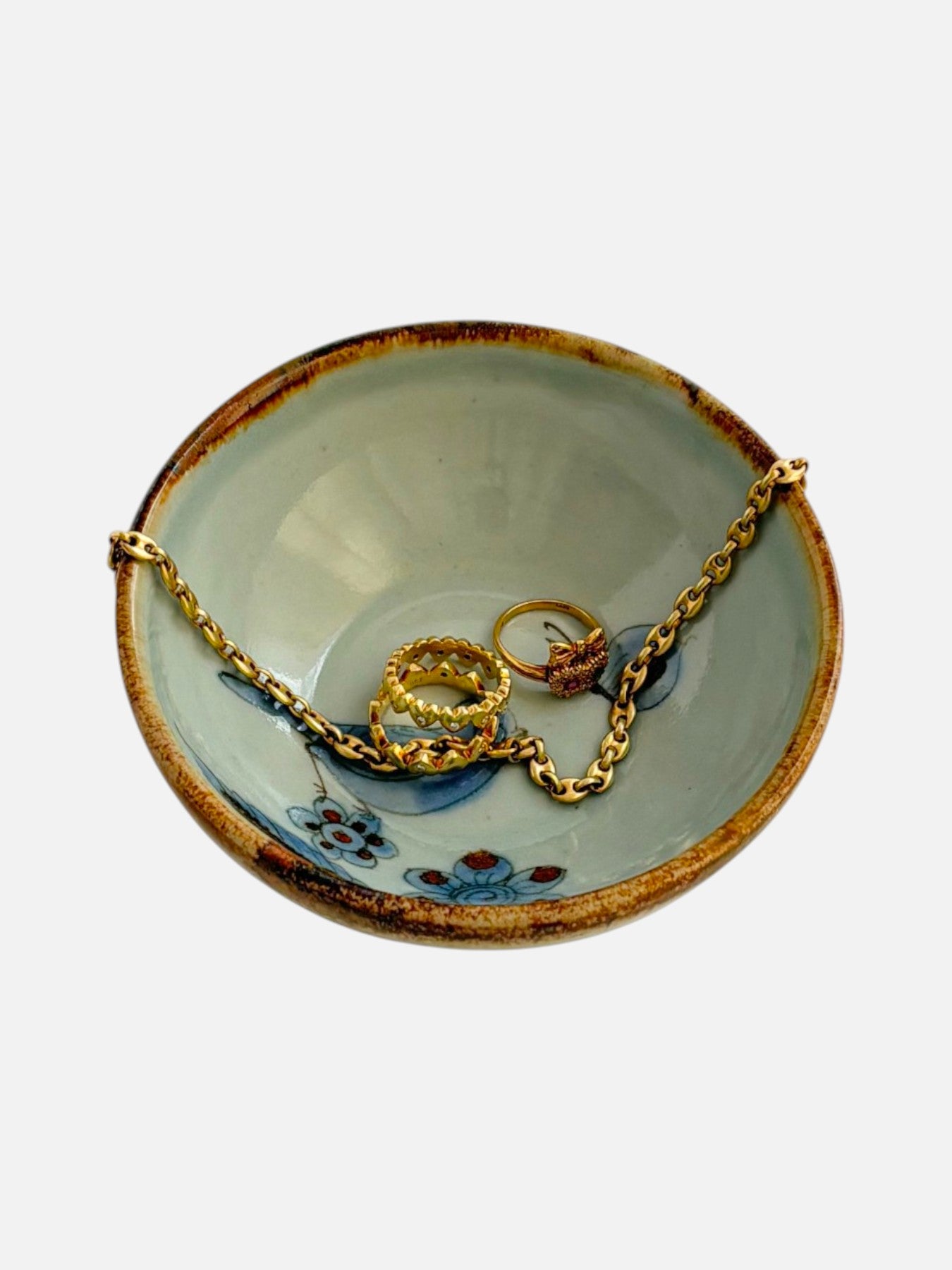 Vintage Ken Edwards Tonala hand-painted and signed round ceramic trinket bowl dish handmade in Mexico featuring bird and floral design shown holding jewelry