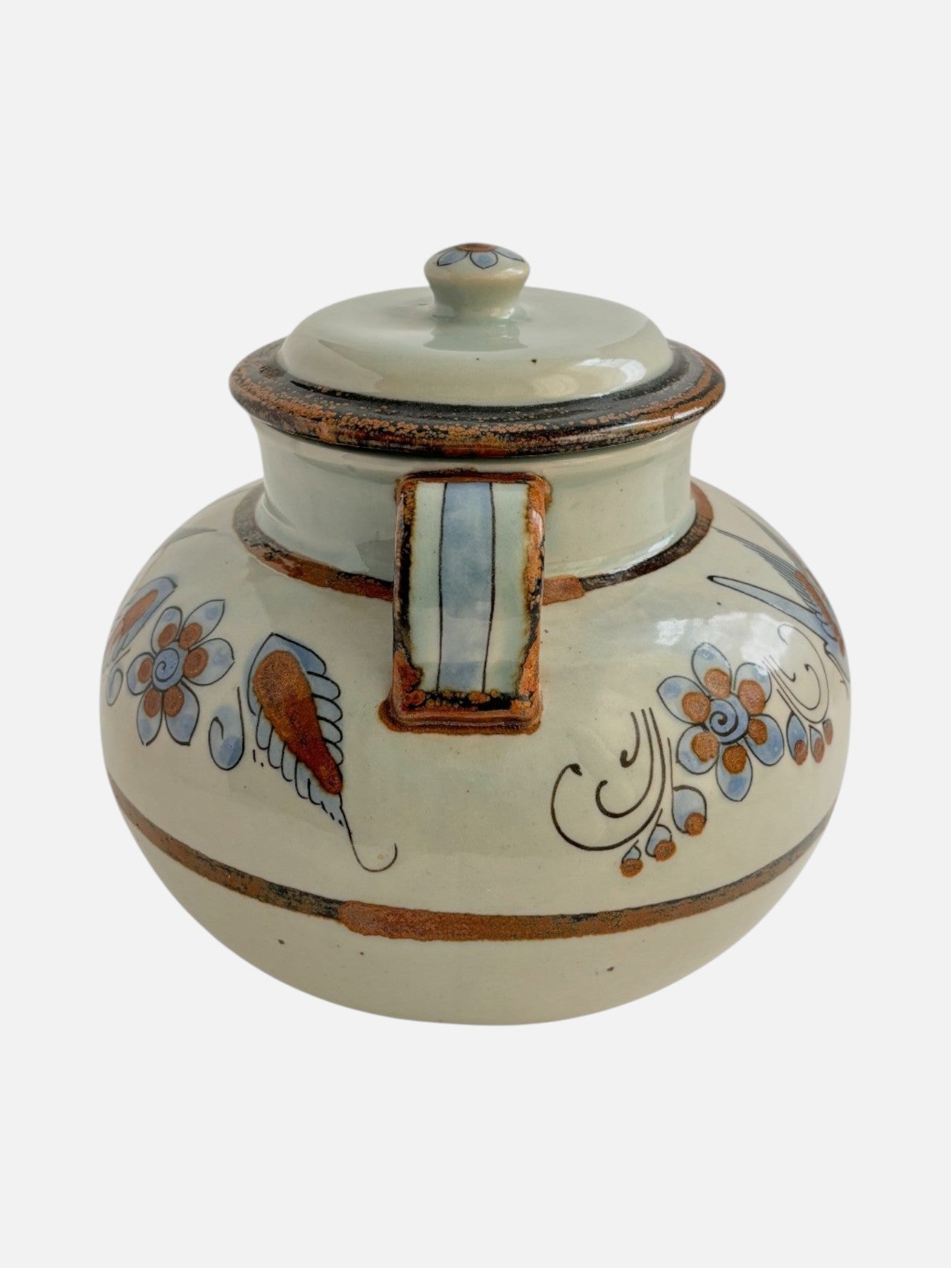 Vintage Ken Edwards Tonala hand-painted and signed round ceramic lidded pottery jar canister with handles handmade in Mexico featuring bird and floral design side view